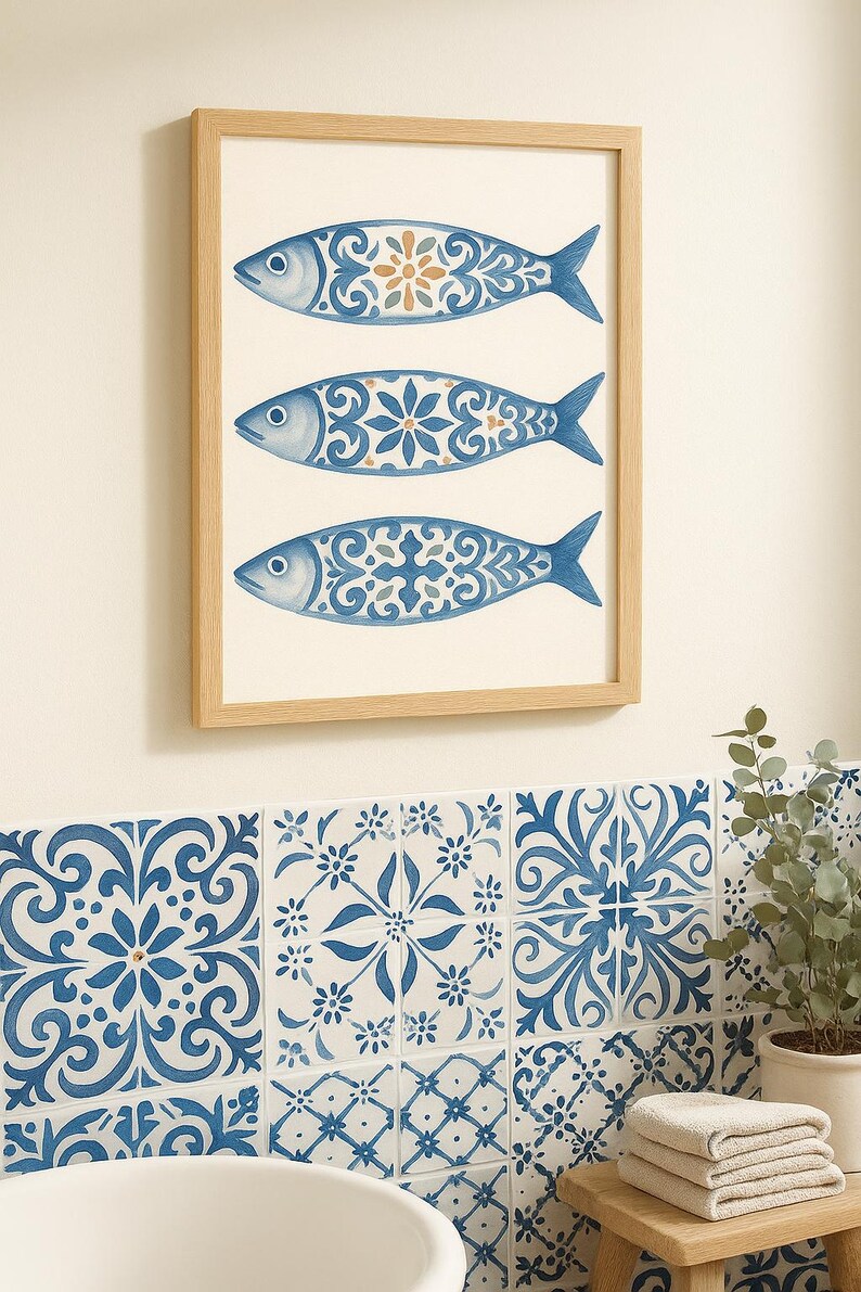 Azulejo sardine wall art above blue patterned tiles, Mediterranean bathroom coastal decor.
