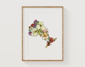 May include: A framed print featuring a floral illustration in the shape of Ontario, Canada. The artwork showcases a variety of flowers in shades of yellow, purple, and red, set against a white background. The frame is a natural wood color.