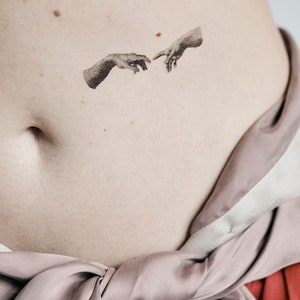 Renaissance temporary tattoo in Italy the creation of Adam x2 copies