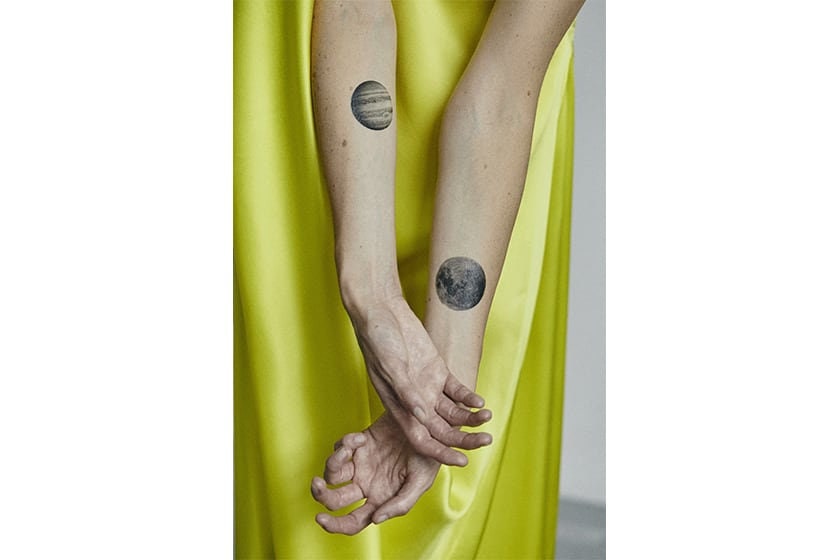 Ephemeral tattoos imminent take-off space and universe with his scientific notebook