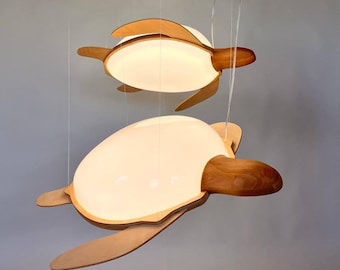 A Composition of Bright Lamps in the shape of Sea Turtles for the Living Room. Handmade Designer Lighting for the Dining Room in your Home