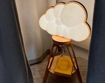 A soft, warm floor lamp with a knitted shade called Sensitive sky/ A unique bedside lamp with touch control and dimmer function for children