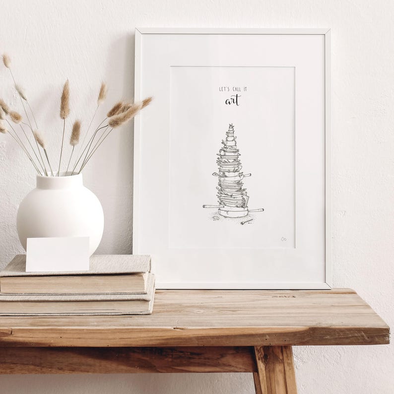 May include: A black and white illustration of a stack of dishes with the text "Let's call it art" above the image.
