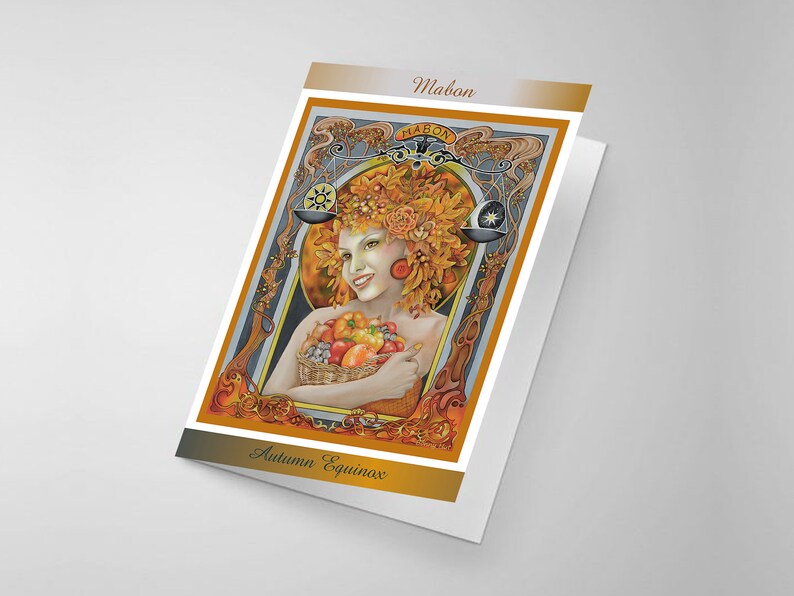 May include: A greeting card with an illustration of a woman adorned with autumn leaves, holding a basket of fruit. The card displays the text "Mabon" and "Autumn Equinox". The artwork is framed with ornate gold and orange details.