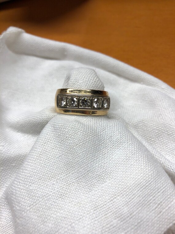 Men's gold wedding ring with channel set diamonds Gem