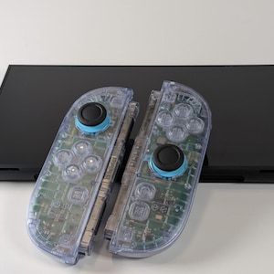 Joy-Cons personalizados para Nintendo Switch 2, translúcidos, azul glaciar.