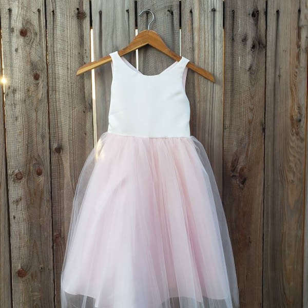 Simple, but elegant Ivory blush flower girl dress.