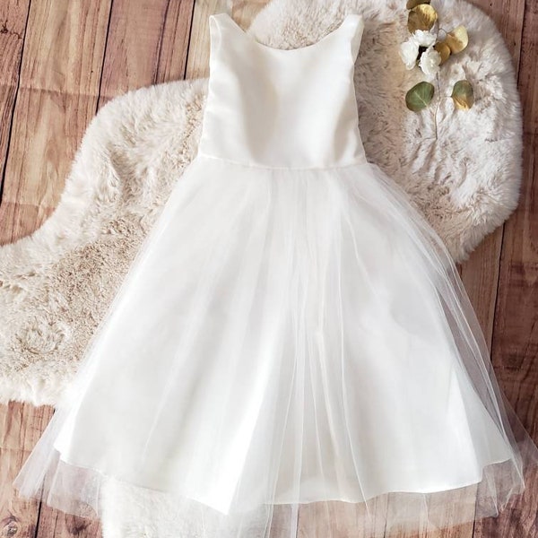 Simple Yet Elegant All Ivory Dress perfect for a flower Girl.