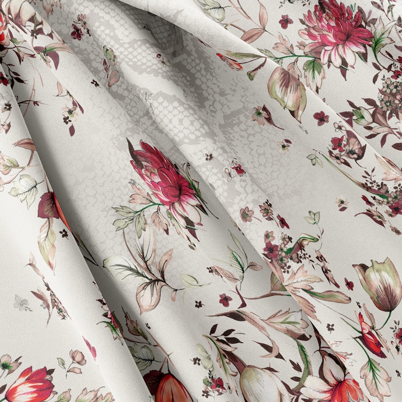 May include: White fabric with a floral pattern featuring red and pink flowers and green leaves. The fabric has a subtle snakeskin texture.
