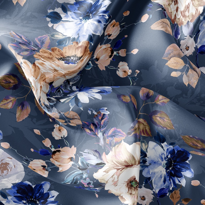 May include: A blue fabric with a floral pattern. The flowers are in shades of blue, white, and brown. The fabric is soft and silky.