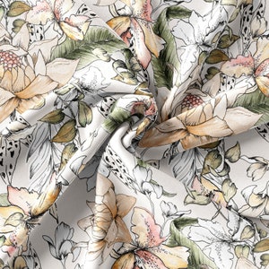 May include: A white fabric with a floral pattern in shades of brown, pink, and green. The flowers are stylized and have a painterly look.