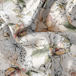 May include: A white fabric with a floral pattern. The flowers are drawn in shades of brown, pink, and green. The fabric has a soft, flowing texture.