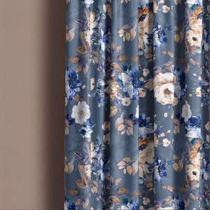 May include: Blue floral curtain panel with a watercolor-style design featuring large white and blue flowers with brown leaves.