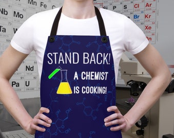Funny Apron for a Chemist. Gift for chemistry geeks who love cooking with a caution to stand back while a kitchen science is happening.