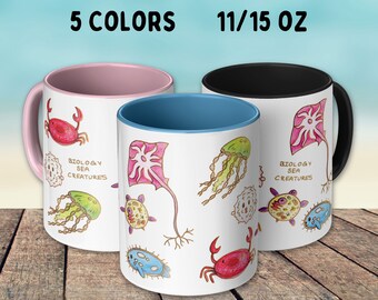 Sea creatures mug for ocean lovers, marine biology students and teachers, beach life fan. Cute kawaii drawing of jellyfish, crab, sea turtle