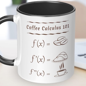 May include: White ceramic coffee mug with a black rim and handle. The mug has a brown graphic that says "Coffee Calculus 101" and includes a math equation with coffee beans, a cup of coffee, and a cloud of steam.