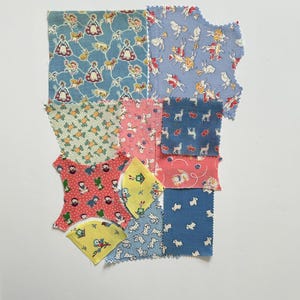May include: A collection of fabric swatches in various shapes and sizes, featuring whimsical patterns. The fabrics display a range of colors, including blue, pink, yellow, and red, with repeating designs of figures, animals, and geometric shapes. The swatches are arranged on a white background.