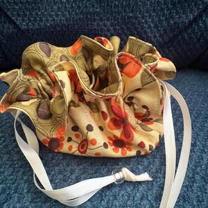 Drawstring Yellow/cream floral olive polka dot design travel jewelry pouch