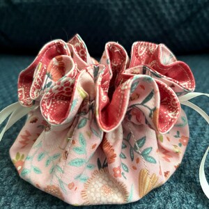 Drawstring pink floral design travel jewelry pouch