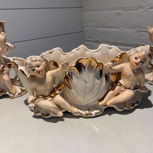 Vintage 3 pc. set of cherub  candleholders, and bowl.