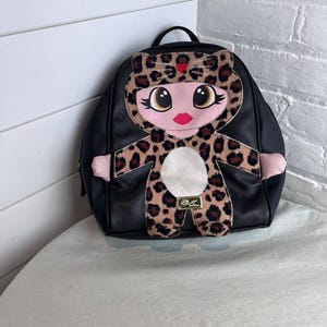 betsey johnson mini backpack with patches Women's Clear in Dots Crafted from a luxuriously soft velvet fabric Betsey johnson yellow backpack -
