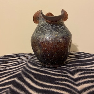 Vintage Hand blown purple art glass vase with folded edges.