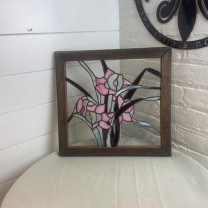 Vintage Handmade Stained Glass Flowers in a wooden frame.