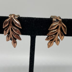 Vintage Matisse leaf clip on earrings