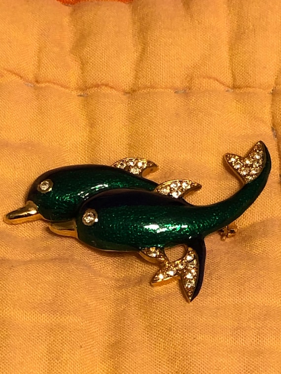 Beautiful dolphin brooch
