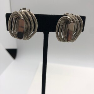 Vintage beautiful Hobe Silvertone clip on earrings