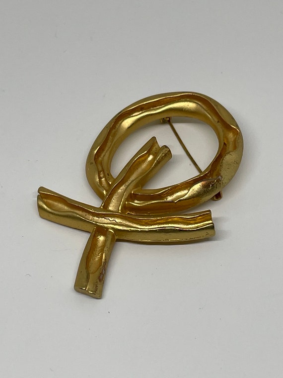 Vintage goldtone AJC brooch