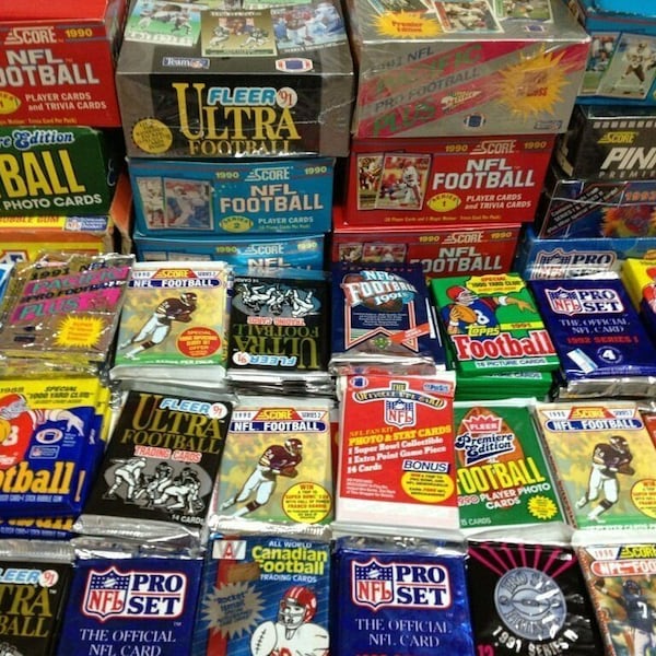 100 Unopened Vintage NFL Football Cards in Factory Sealed Wax Packs | Superior Sports Investments