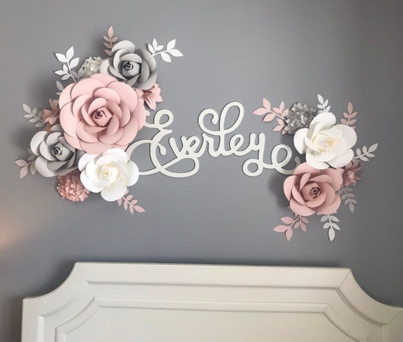 Paper flower backdrop in colors white, pink, black and silver used