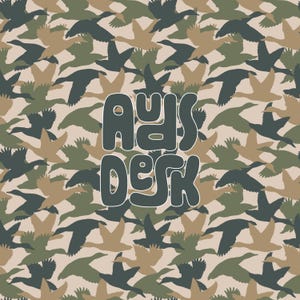 May include: A camouflage pattern background with the text "Ads Desk" in a bold, black font.