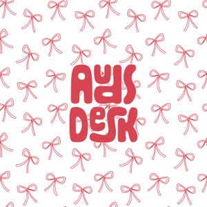May include: A red and white illustration of the words "Ads Desk" on a white background with a repeating pattern of red bows.