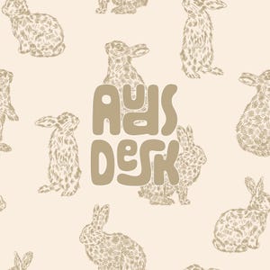 May include: A seamless pattern featuring brown rabbits and the text "Ads Desk" in a brown, stylized font. The rabbits are drawn in a vintage style with a textured pattern.