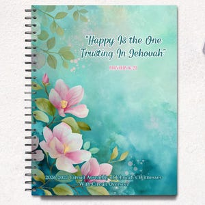 May include: A spiral-bound notebook featuring a teal and blue watercolor background with pink magnolia flowers. The cover displays the text "Happy Is the One Trusting In Jehovah" and "Proverbs 16:20" along with "2026-2027 Circuit Assembly of Jehovah's Witnesses".