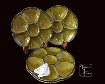 Juego vintage de 4 platos para ostras GIEN Francia, esmaltados en verde oliva con borde negro. Vajilla retro para mariscos, estilo años 70.