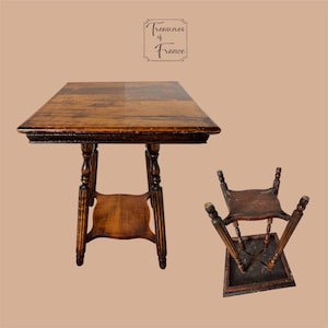 May include: Antique wooden side table with a square top and ornate legs. The table has a lower shelf and a dark brown finish. A matching, smaller table is also shown, turned upside down.