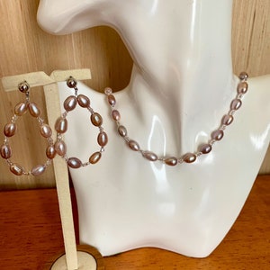 Cultured freshwater pearl necklace and earrings matching set.