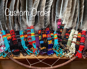 Custom peyote beaded smudge or grad feather. Your choice of colors and finish.