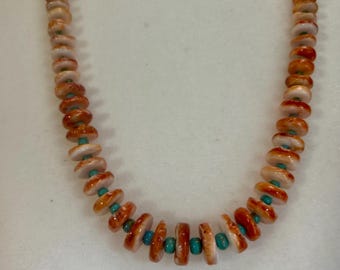 Chunky cut, orange spiny oyster shell and turquoise unisex necklace.
