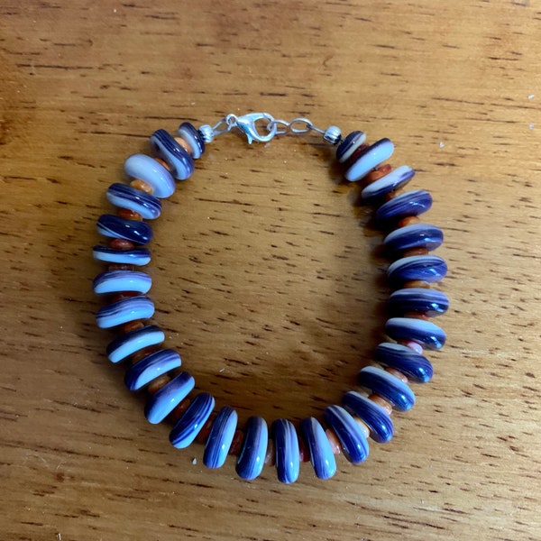 Large wampum shell and orange spiny oyster shell bracelet.