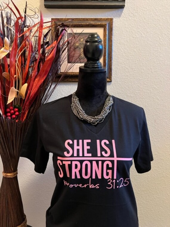 She Is Strong..Proverbs 31:25. Motivational, Inspirational, Christian, Faith Shirts for Women
