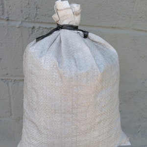 Bonsai soil (Boon's mix) in a 14x10x4" sandbag (dry) with akadama, lava, hyuga pumice and pine bark. Approximately 8 quarts.