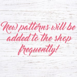 May include: Pink text on a white wood background reads "New patterns will be added to the shop frequently!"