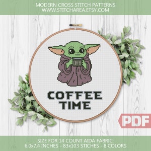 May include: Cross stitch pattern featuring a green character holding a coffee cup with the text "COFFEE TIME". The pattern is designed for 14 count Aida fabric and measures 6.0x7.4 inches, using 83x103 stitches and 8 colors.