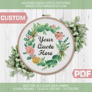 May include: A cross stitch pattern featuring a floral wreath with cacti and succulents in shades of green, pink, and yellow. The wreath surrounds the text "Your Quote Here". The pattern is designed for 14 count Aida fabric and measures 9.5 x 9.6 inches, with 132 x 134 stitches and 22 colors.
