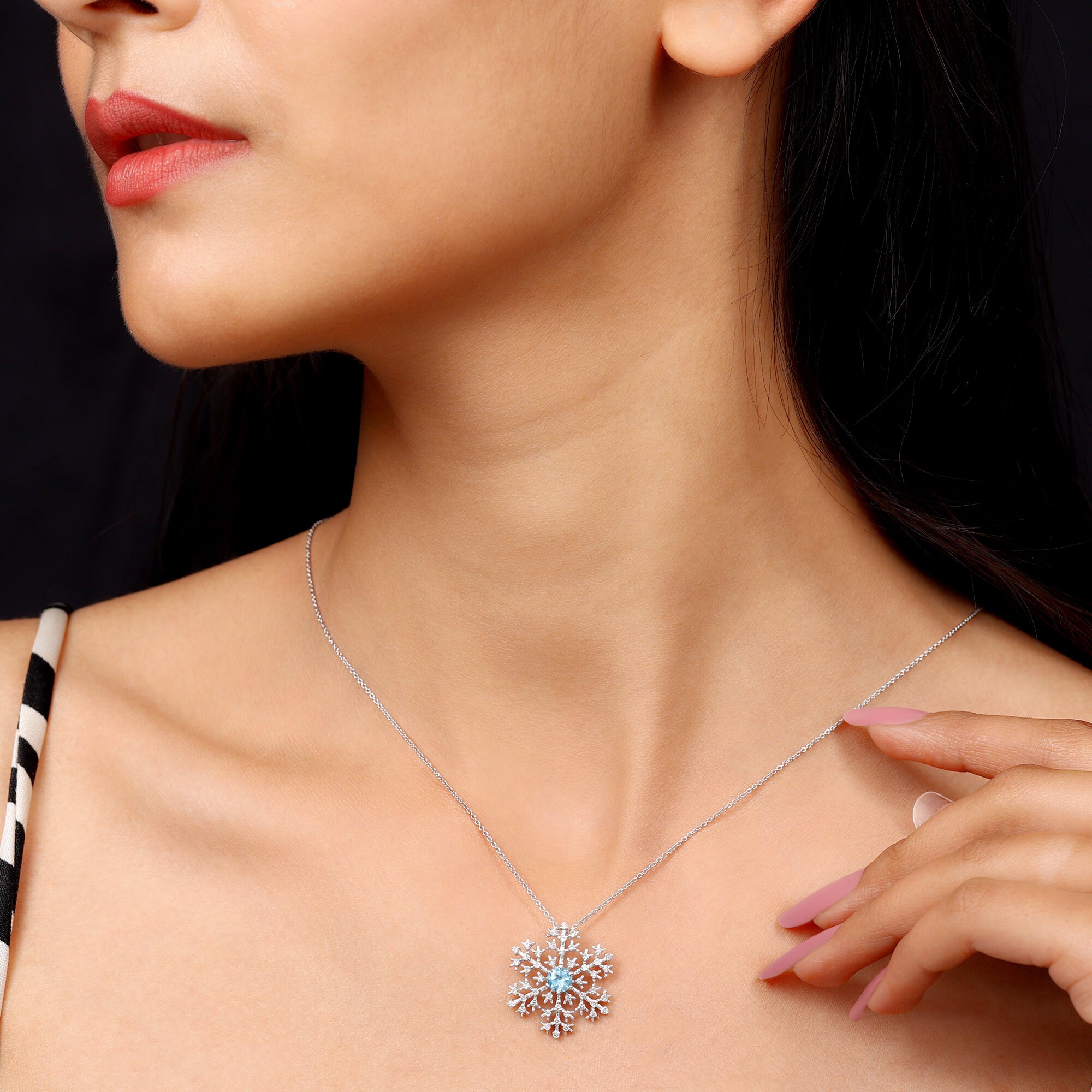 Gold Snowflake Necklace With Swiss Blue 