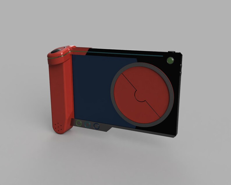 Op de afbeelding: Een rood en zwart handapparaat met een ronde rode knop en een klein scherm. Het apparaat heeft een microfoon aan de zijkant.
